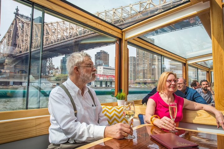 Experience the beauty of New York City’s skyline while sailing the scenic waters enjoying insightful architecture narration and relaxing in style aboard a classic yacht.